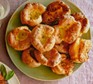 A stack of yorkshire puddings with thyme